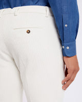 Pantalone chino in velluto a costa larga alternata pesante bianco panna straight fit