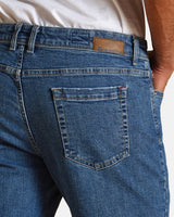 Pantalone cinquetasche jeans in denim di cotone leggero stone washed light regular fit